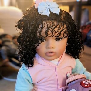 Realistic Baby Doll with Blue Bow